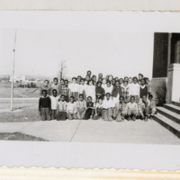 MAF0303_photograph-of-students-beside-the-simms-school.jpg